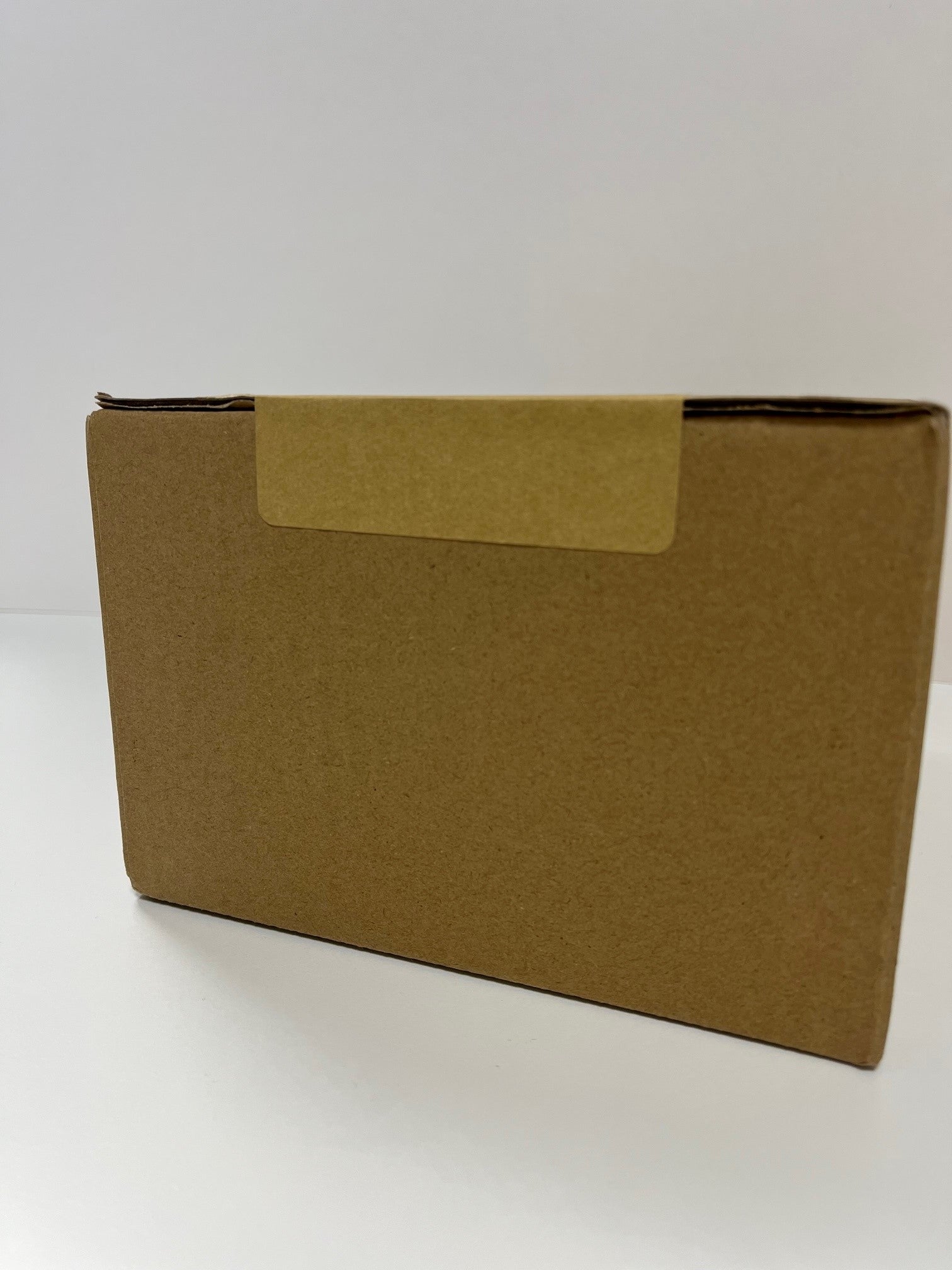 Kraft Paper Seals - 50mm x 88mm (1000 per Roll)