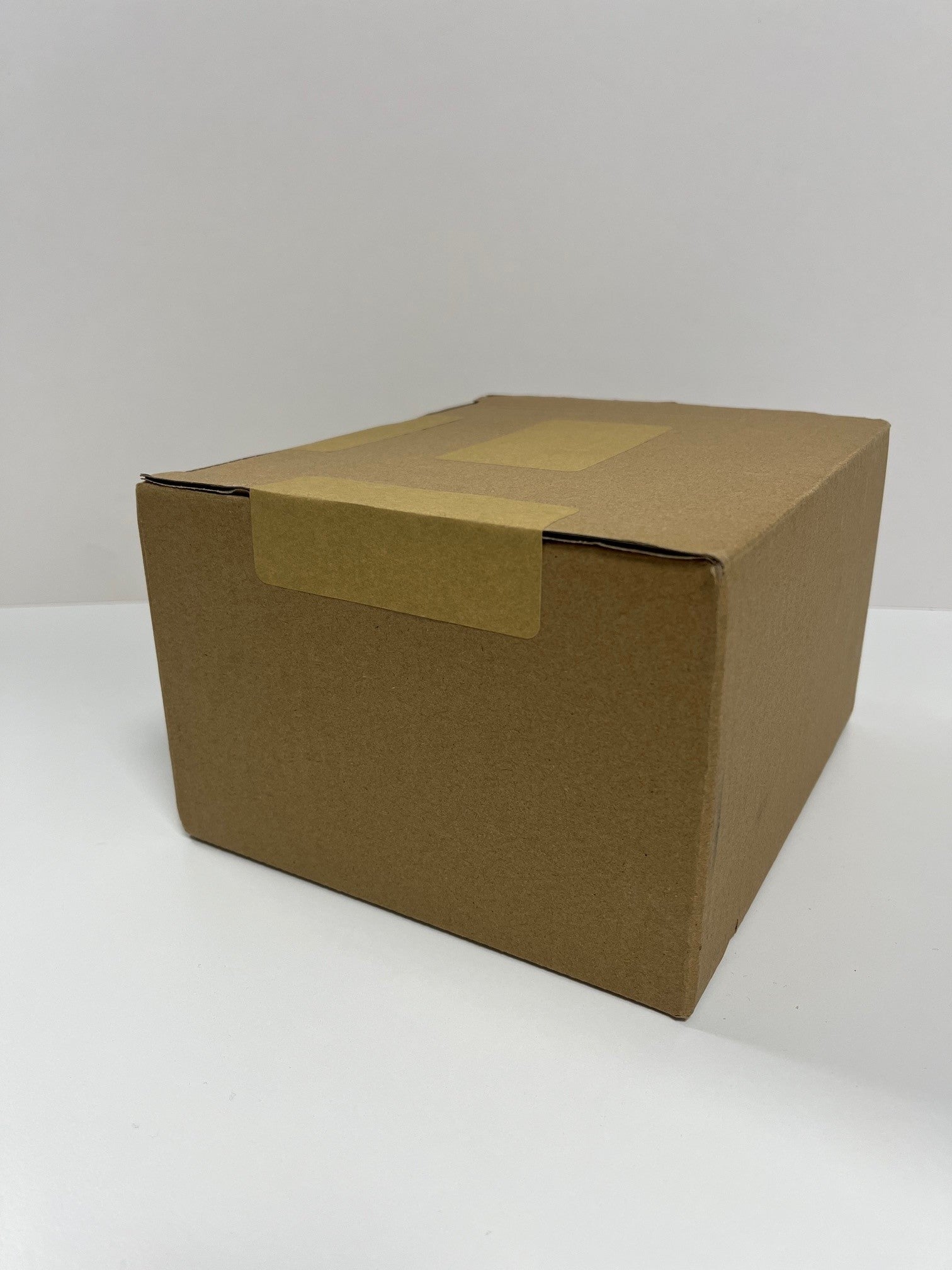 Kraft Paper Seals - 50mm x 88mm (1000 per Roll)